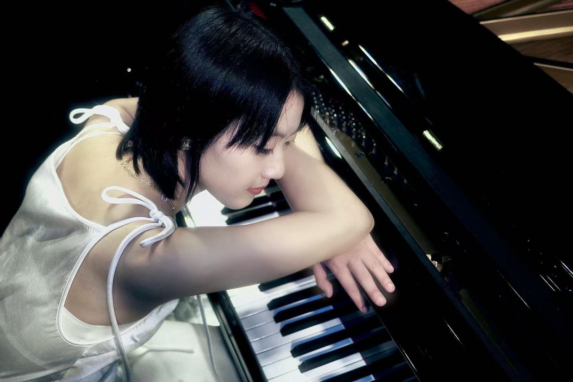 Mingxin Huang